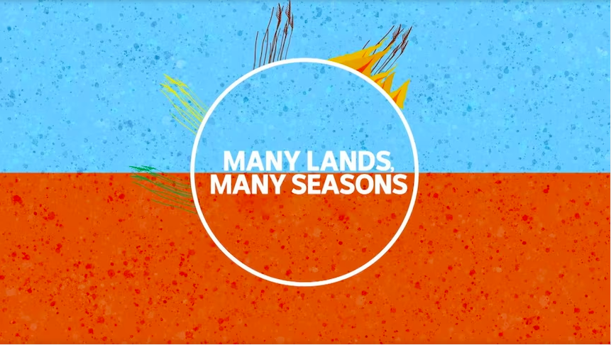 A vibrant image with a blue upper half and red-brown lower half, featuring abstract leaf designs. The text "Many Lands, Many Seasons" is centered in a white circle.