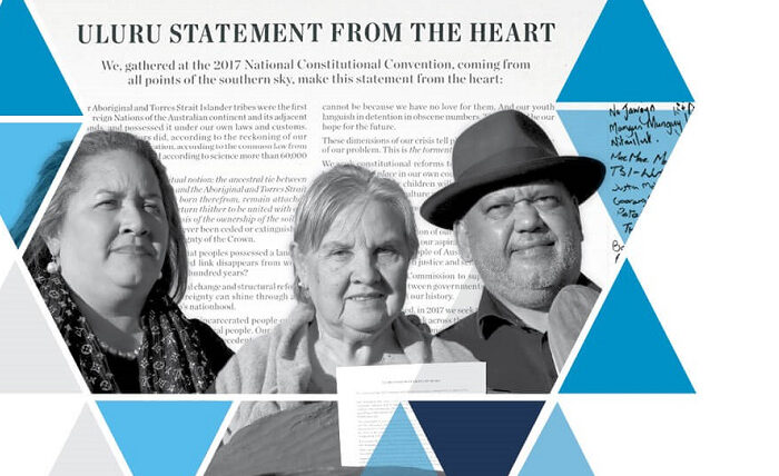 Three people stand in front of the "Uluru Statement From The Heart" text, surrounded by blue and gray geometric triangles, conveying unity and purpose.