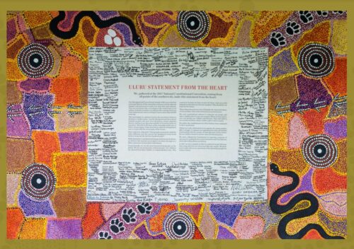 Colorful Indigenous artwork surrounds a central text box titled "Uluru Statement From the Heart," featuring serpentine shapes and dot patterns.